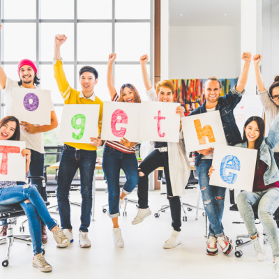a group of people holding signs